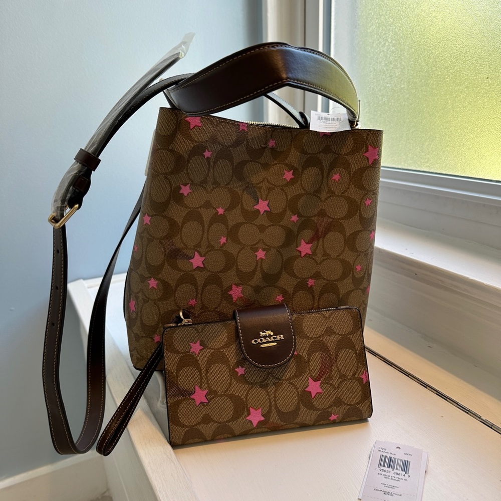 Coach shooting star initial bucket bag and phone wallet.